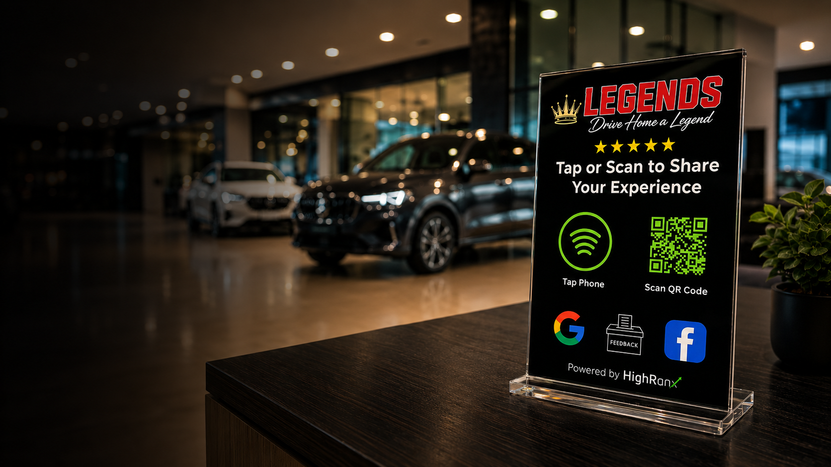 Custom-branded Legends Smart Plax™ display on a dealership counter with luxury cars in the showroom background